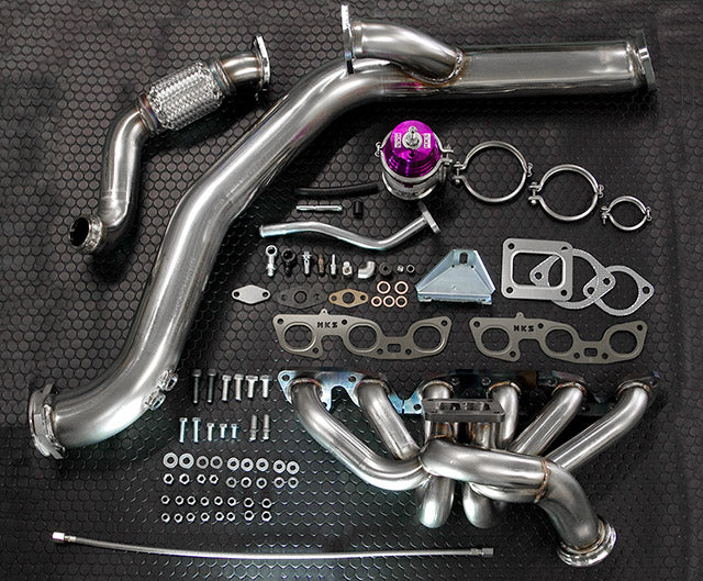 HKS Single Turbo Setup Kit components for Nissan GTR including turbo, manifold, wastegate, and piping.